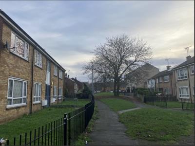 Communal grassed area/ walkway