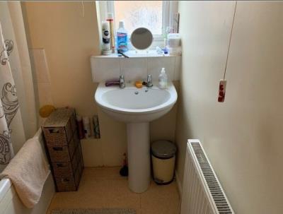 Bath with overhead shower
