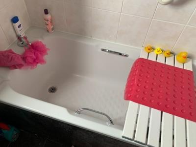 Bathroom- bath with overhead shower
