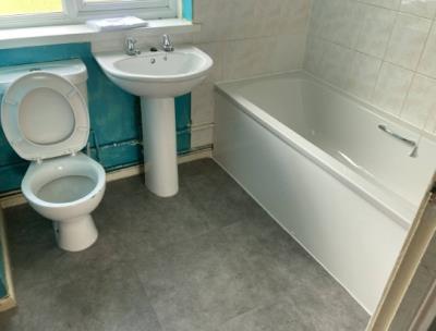 Bath with overhead shower