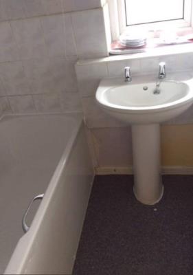 Bath with overhead shower