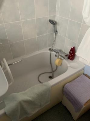 Bathroom Bath with overhead shower