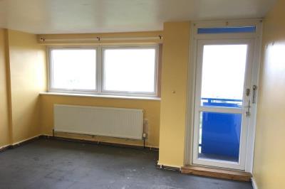 Lounge with access to small private balcony